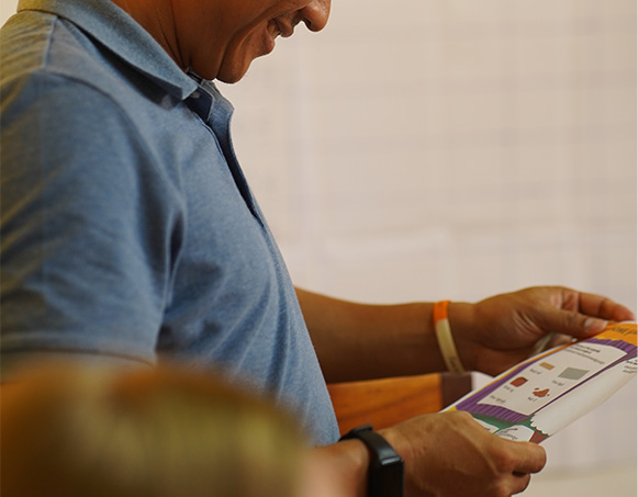 Potential sponsor reviewing brochure