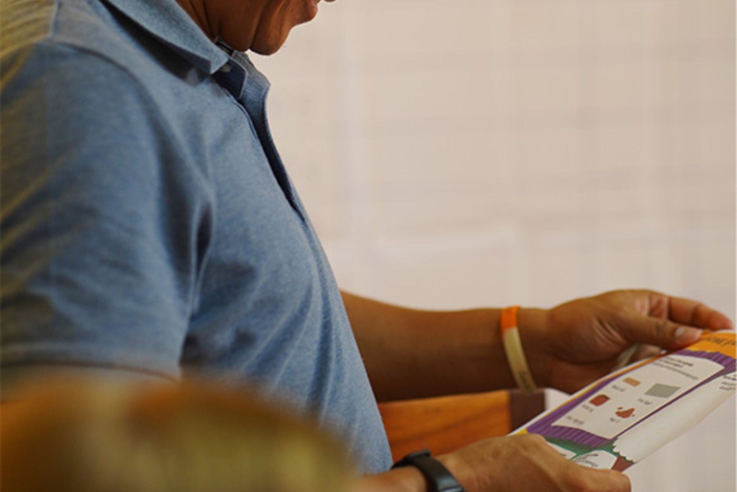 when-i-grow-up-sponsor-reviewing-brochure